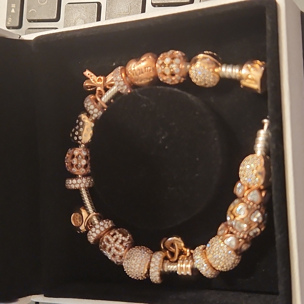 Original Pandora bracelet and charms Rose Gold purchased at Pandora store